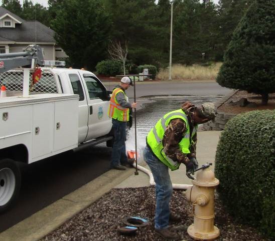 fire hydrant flushing photo