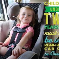 Children under two now need to be in a rear facing car seat.